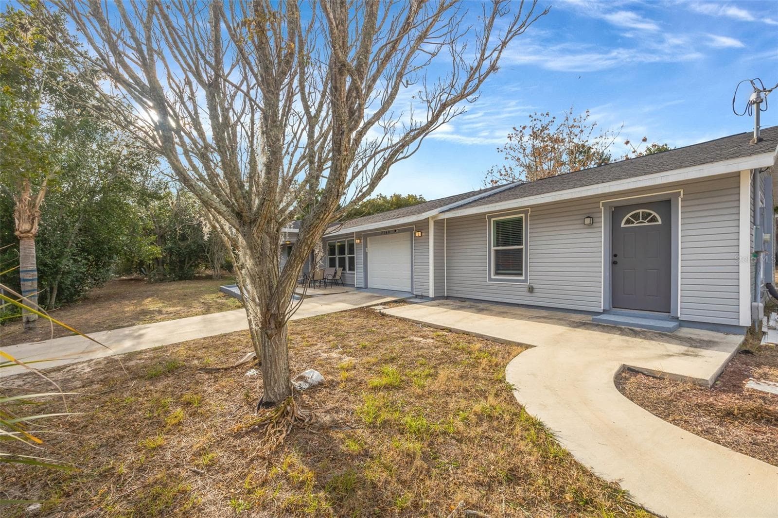 Private entrance to in-law suite - 7149 SPRUCE DR, WEEKI WACHEE