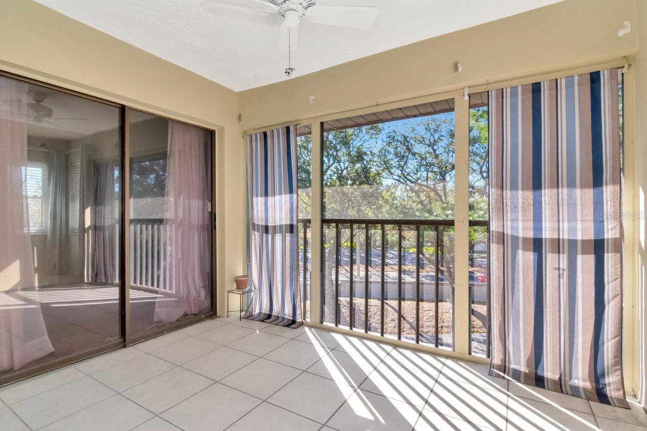 Screened Balcony - 2650 COUNTRYSIDE BLVD #F303, CLEARWATER