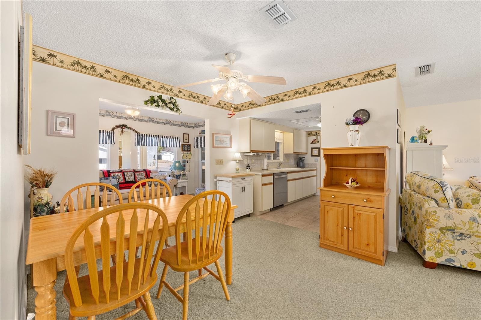 Dining open to Kitchen and Florida Room - 10319 SE 177TH PL, SUMMERFIELD