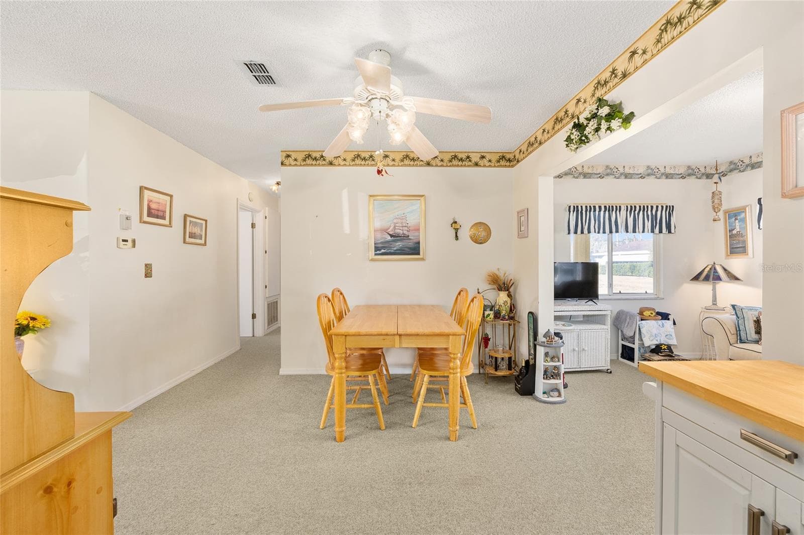 Dining with Hall to Bedrooms - 10319 SE 177TH PL, SUMMERFIELD