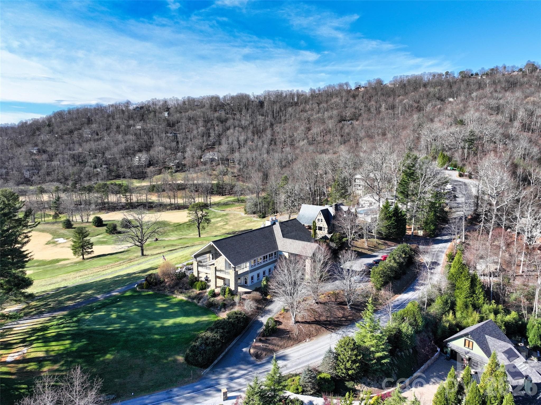 Aerial view of Clubhouse, putting green. pub and The Laurel Room event space - 9999 Walnut Drive, Mills River