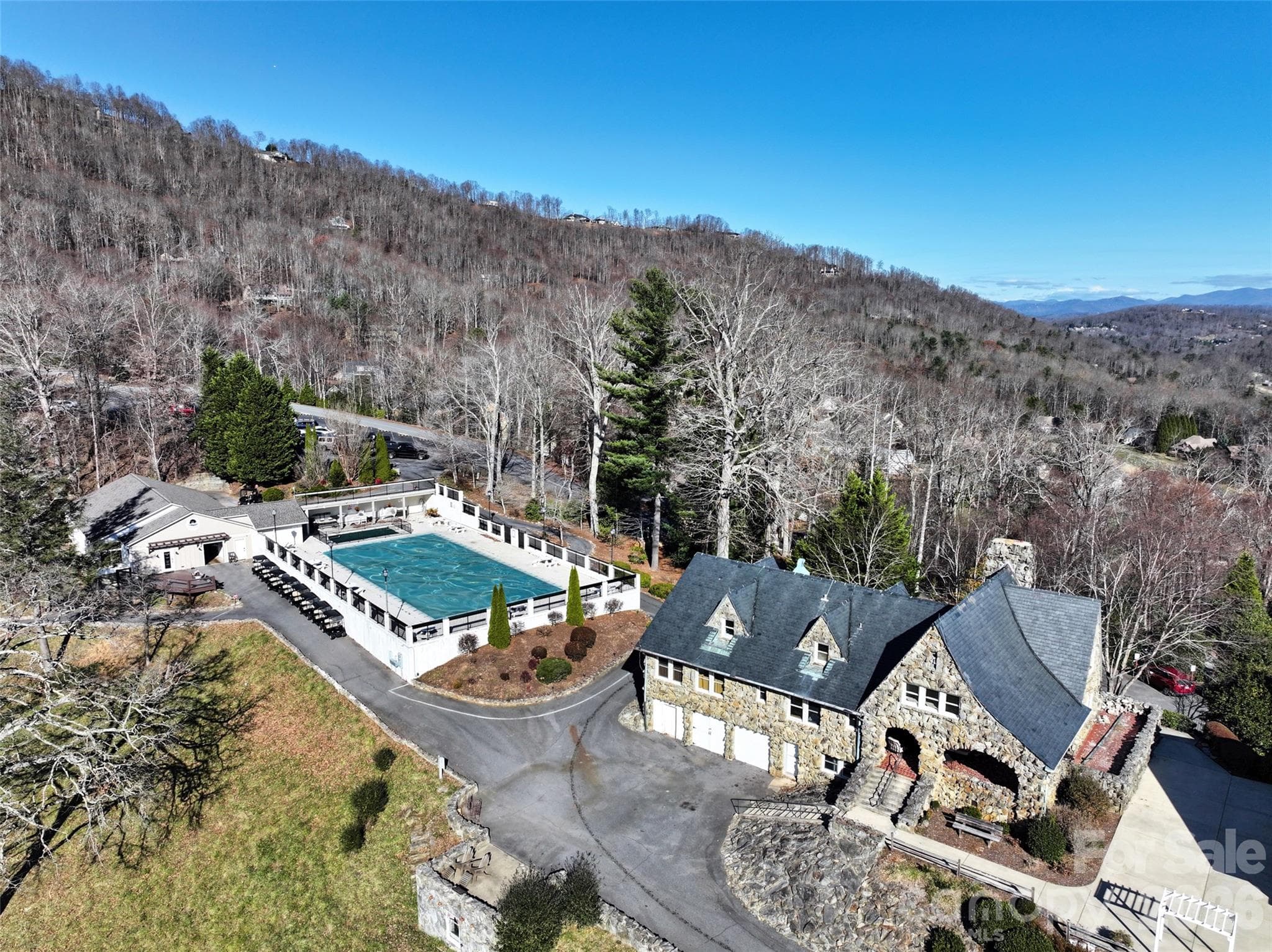Aerial view of Clubhouse and pool (amenity available for purchase separately) - 9999 Walnut Drive, Mills River