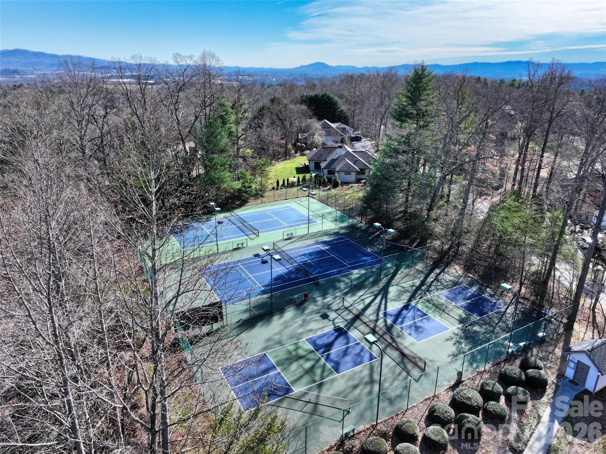 Aerial Shot of Tennis Courts (amenity available for purchase separately) - 9999 Walnut Drive, Mills River