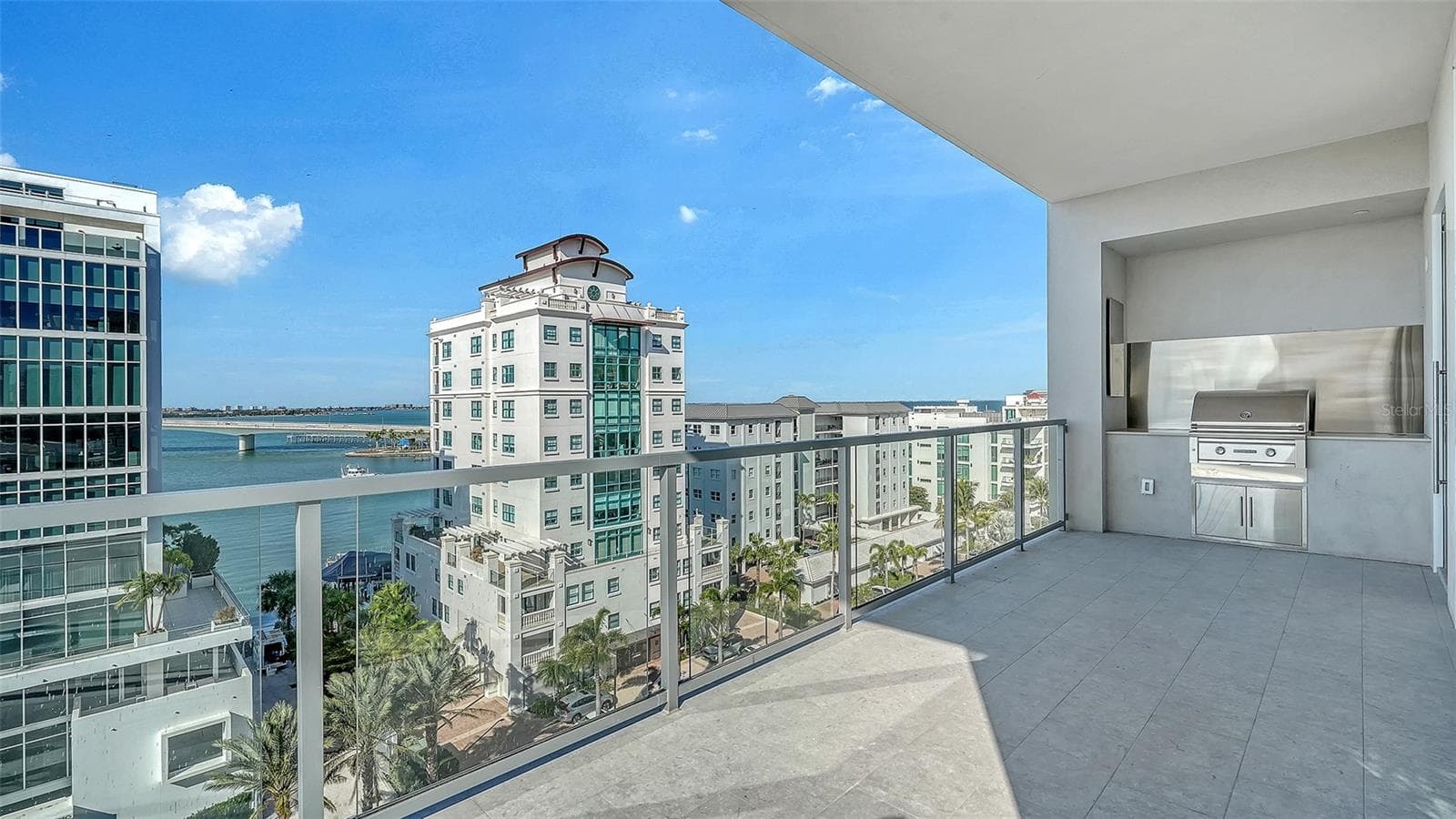 Large balcony with summer kitchen - 253 GOLDEN GATE POINT #703, SARASOTA