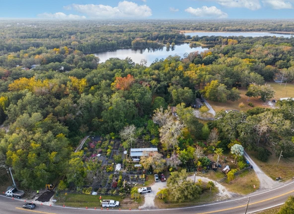 Lake Frontage Single Family Home adjacent to 3 additional parcels currently Tampa Bay Nursery on Gunn Highway - 9906 GUNN HWY, ODESSA