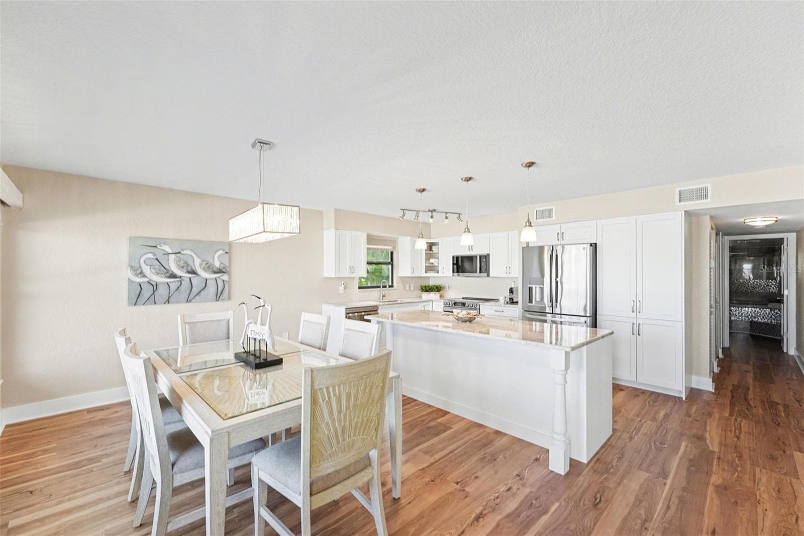The lower level offers two bedrooms and two baths, and was fully renovated in 2025. - 19936 GULF BLVD, INDIAN SHORES