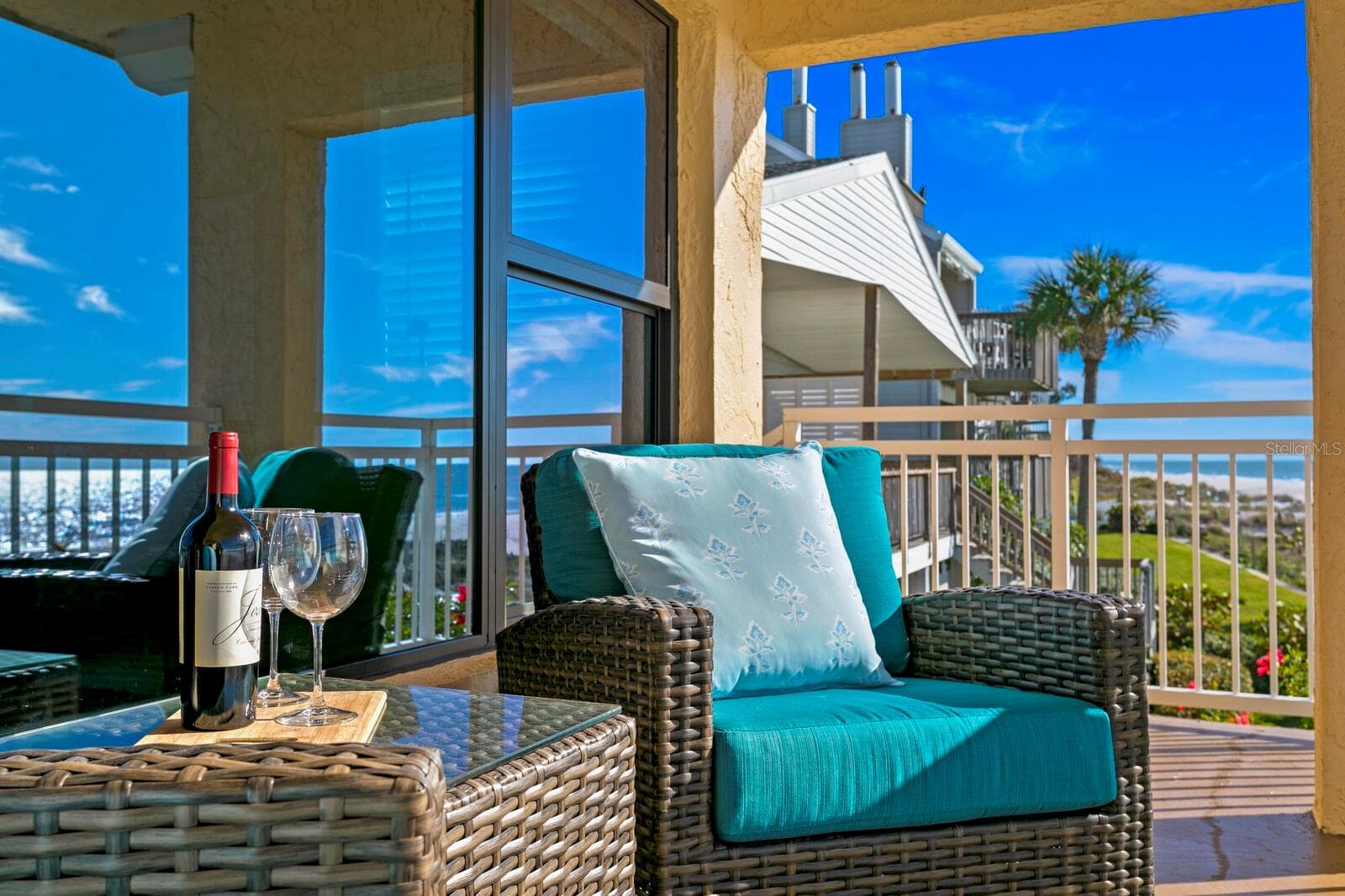Second level balcony overlooks the sand, the beach, and the stunning sunsets. The epitome of coastal living! - 19936 GULF BLVD, INDIAN SHORES