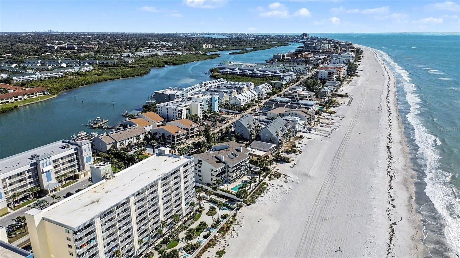 Conveniently located near renowned restaurants, medical facilities, top-rated schools, major interstates, and two international airports, this private seaside haven is ready to welcome you home. - 19936 GULF BLVD, INDIAN SHORES