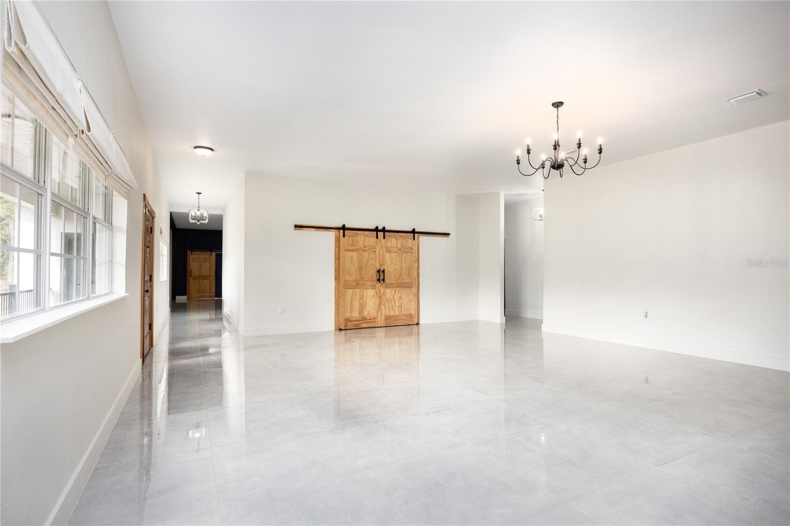 Living Room from Primary Suite hallway - 12456 155TH PL, LIVE OAK