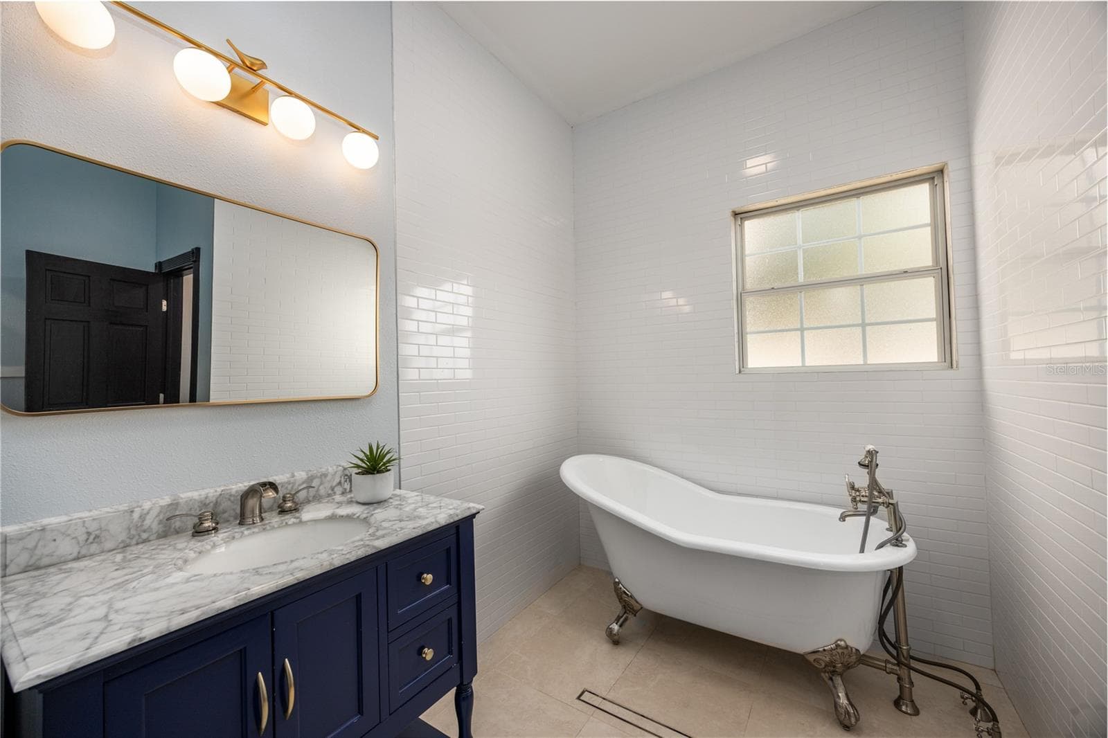 Bath 2 - clawfoot tub/vanity - 12456 155TH PL, LIVE OAK