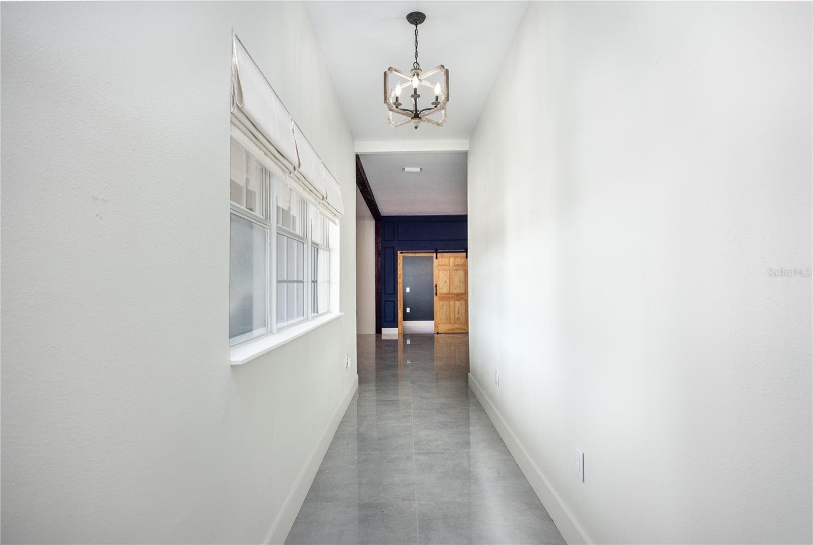 Front hallway from front door to dining room area - 12456 155TH PL, LIVE OAK