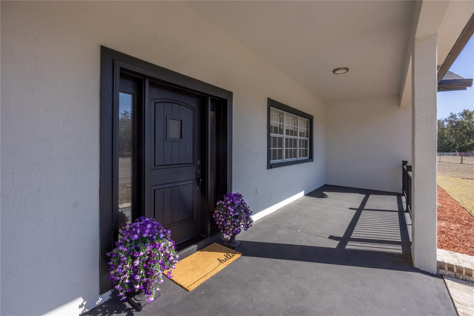 Front door view on porch - 12456 155TH PL, LIVE OAK