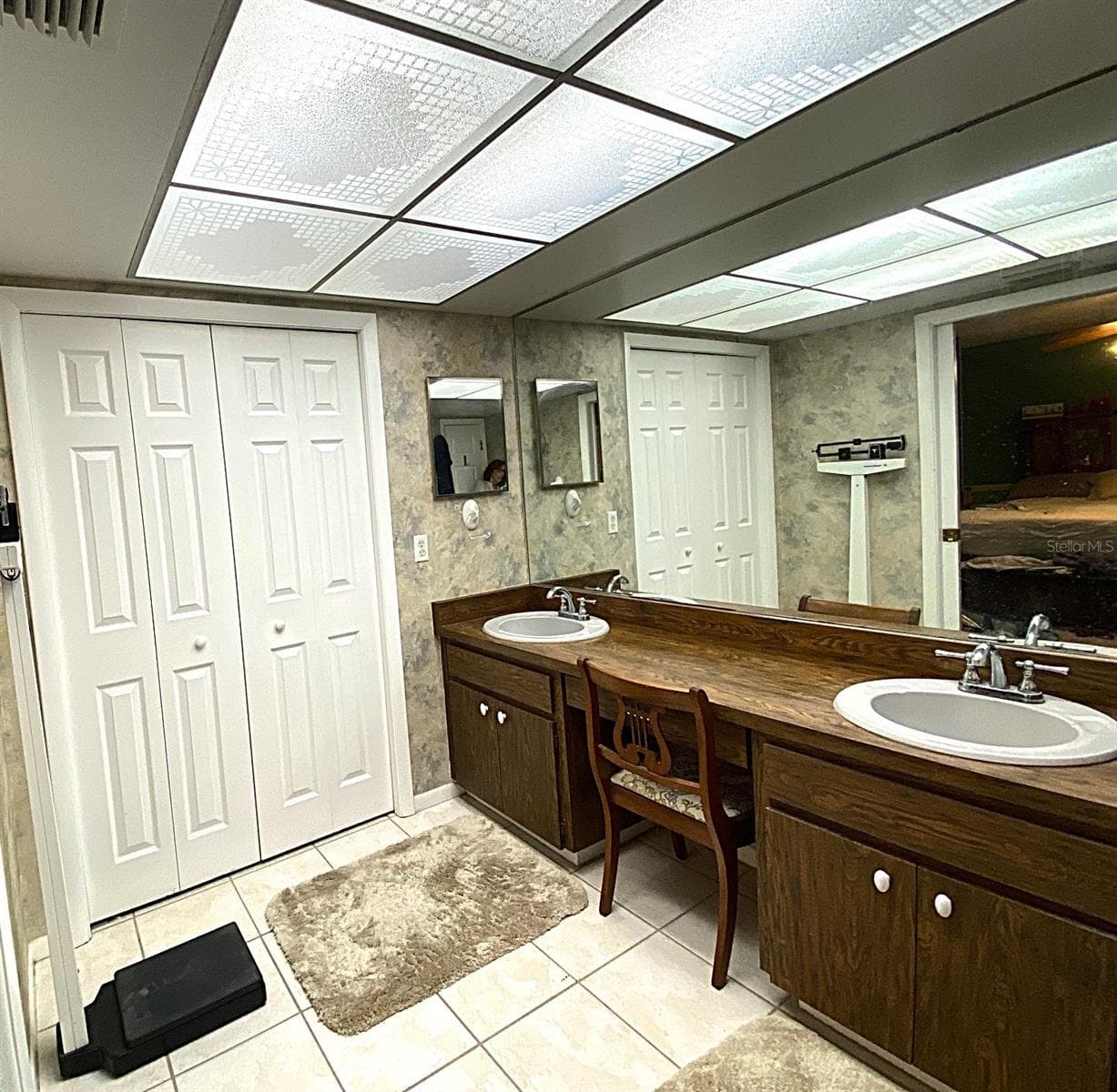 Master bath has 2 closets, make-up vanity, double sinks, lots of lighting and tiled shower. Measures 9'x7' - 626 ORCHID LN, ALTAMONTE SPRINGS