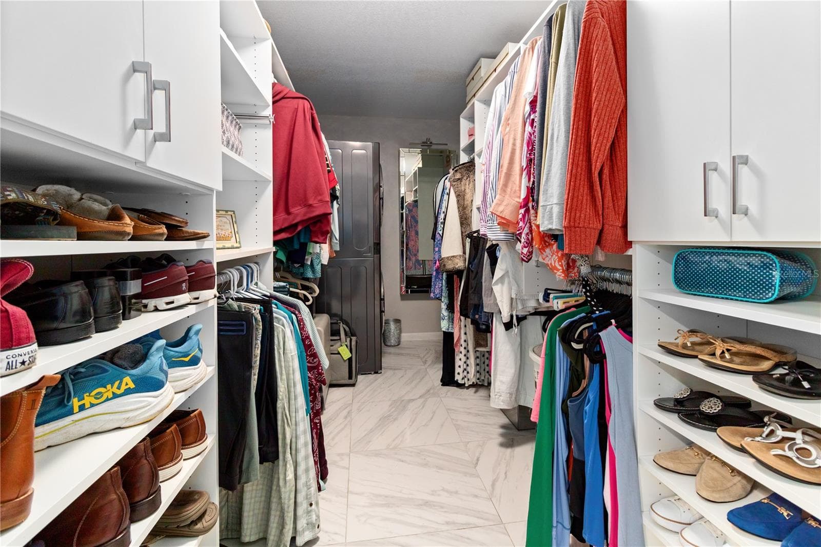 primary walk in laundry closet - 601 LAKE PANSY DR NW, WINTER HAVEN