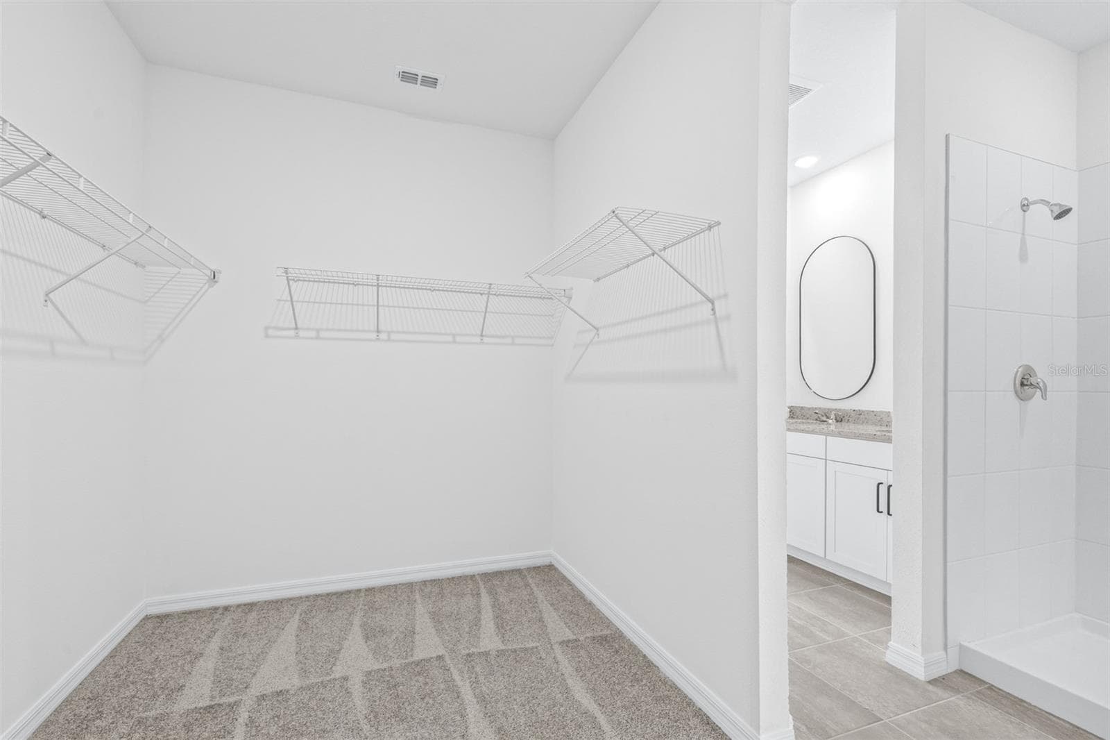 Primary walk-in closet - 2707 VIRGINIA PINE DR, BARTOW