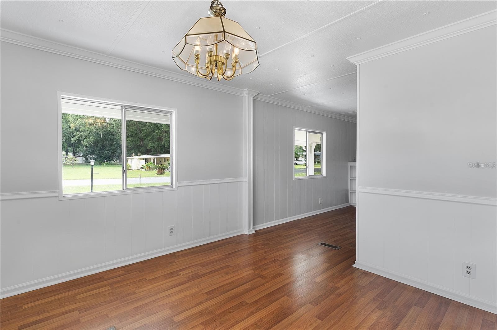 Manufactured Home at 302 IVANHOE CIR, LADY LAKE, photo 9 of 32