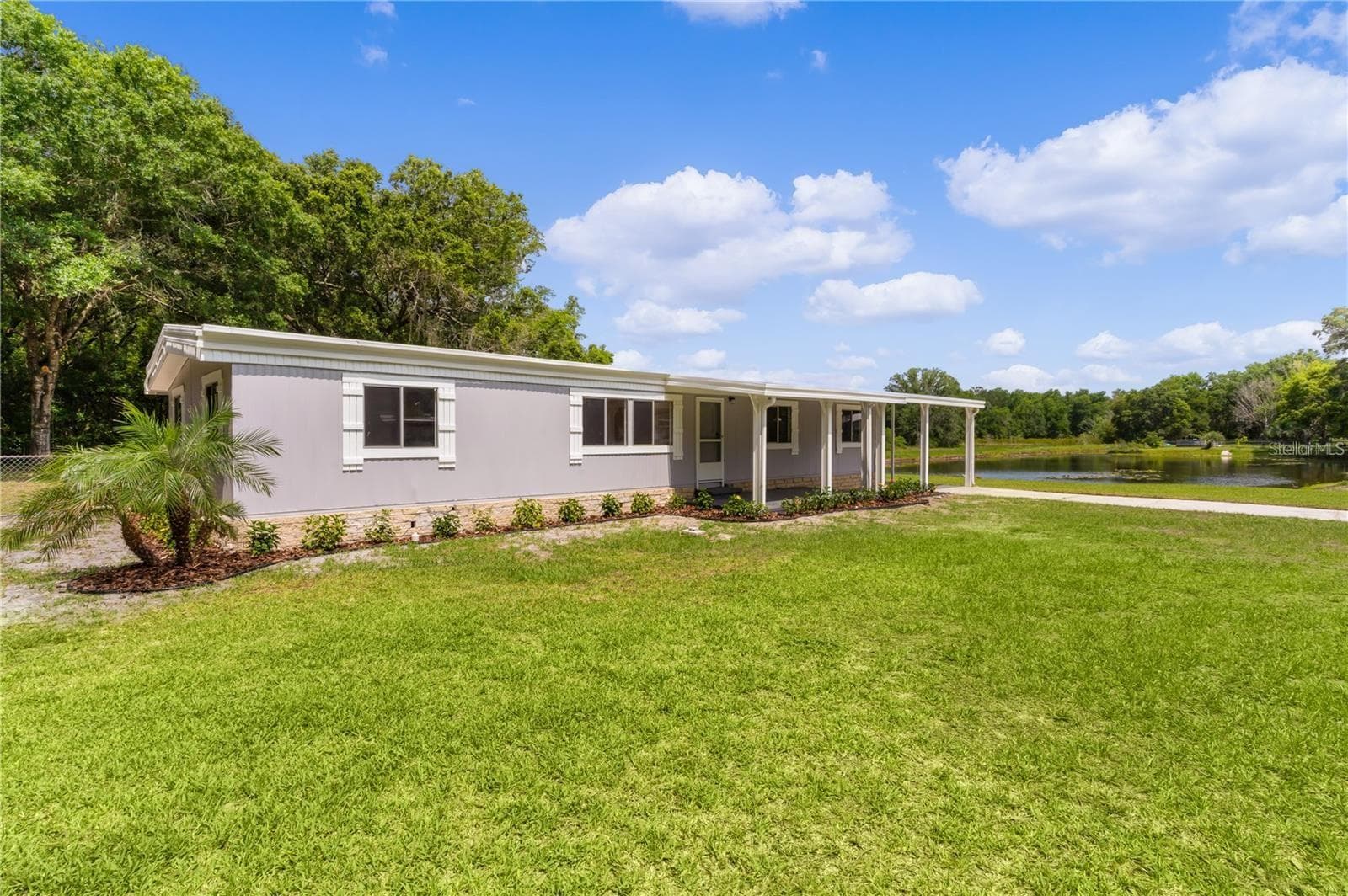 Manufactured Home at 302 IVANHOE CIR, LADY LAKE, photo 29 of 32