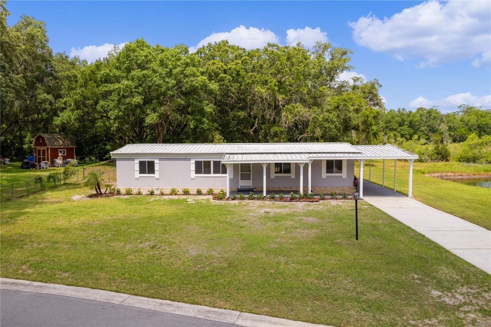 Manufactured Home at 302 IVANHOE CIR, LADY LAKE, photo 31 of 32
