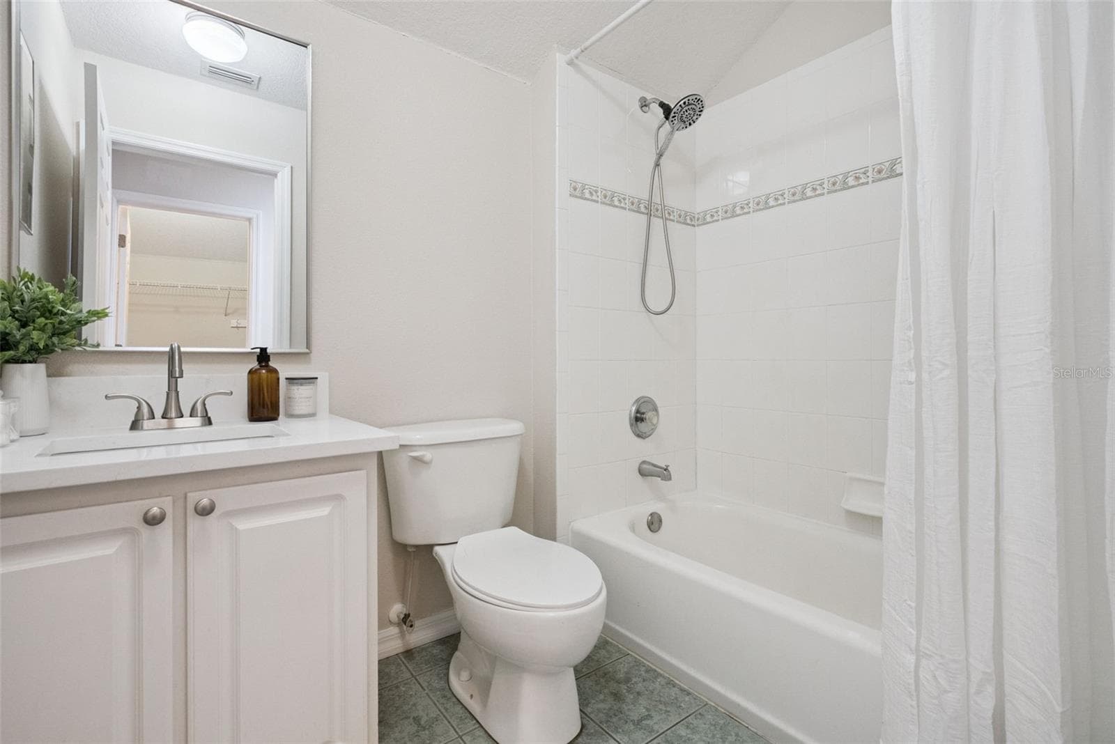 Upstairs Bathroom NEW COUNTERTOP, SINK, FAUCET, AND MIRROR - 3441 HICKORY CREEK RD, DELTONA
