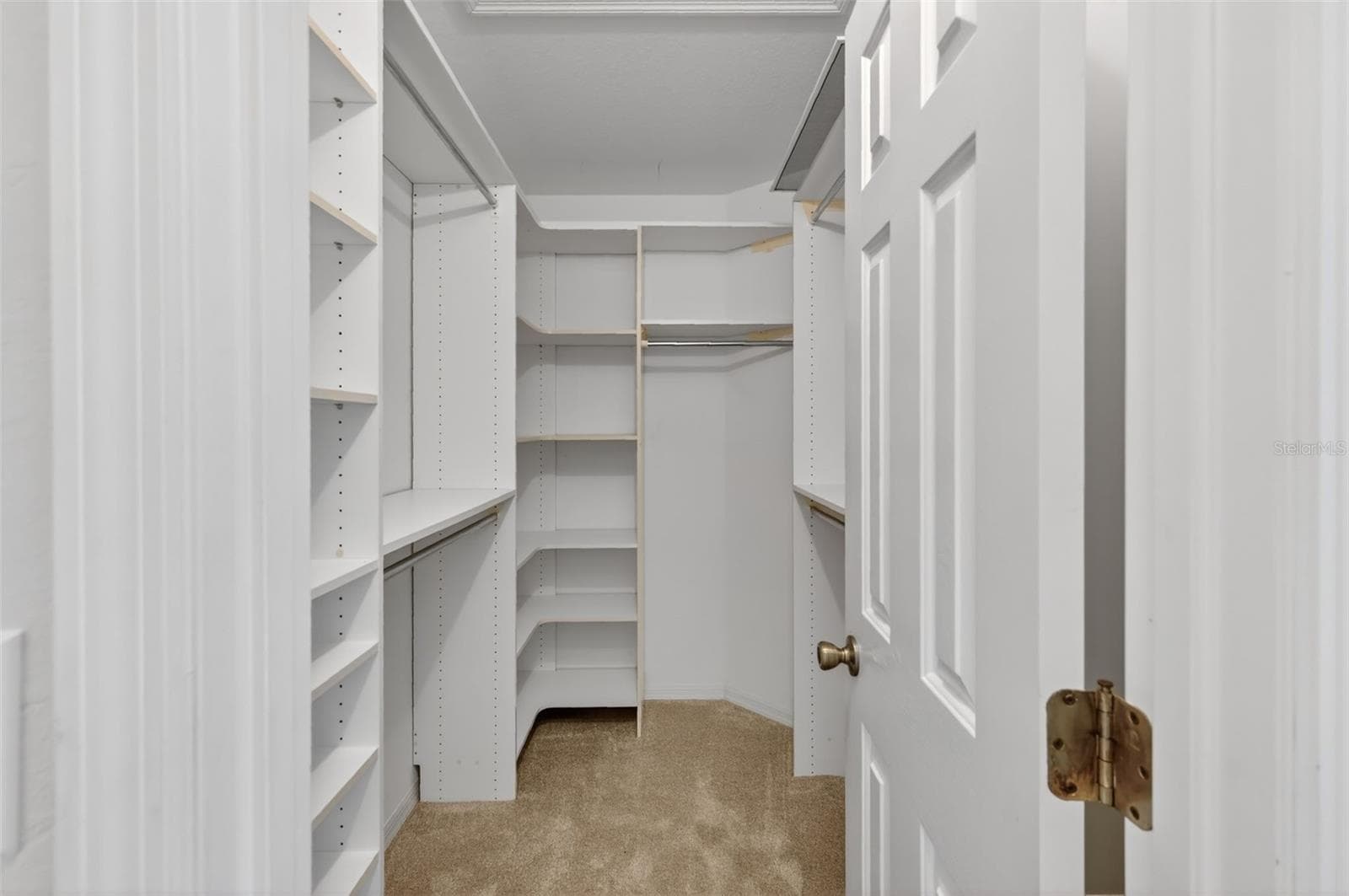 Primary walk-in closet - 9050 SE 135TH LOOP, SUMMERFIELD