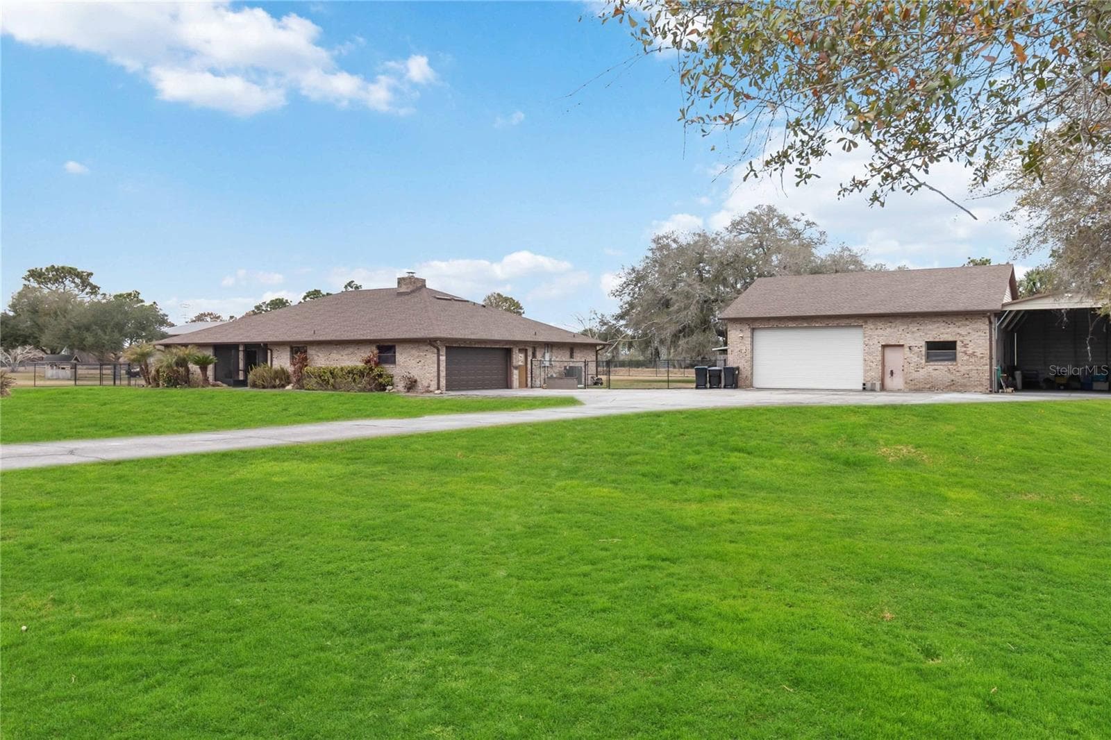 Front Elevation showing home, workshop and Boathouse - 18711 NORTHCLIFF ST, ORLANDO