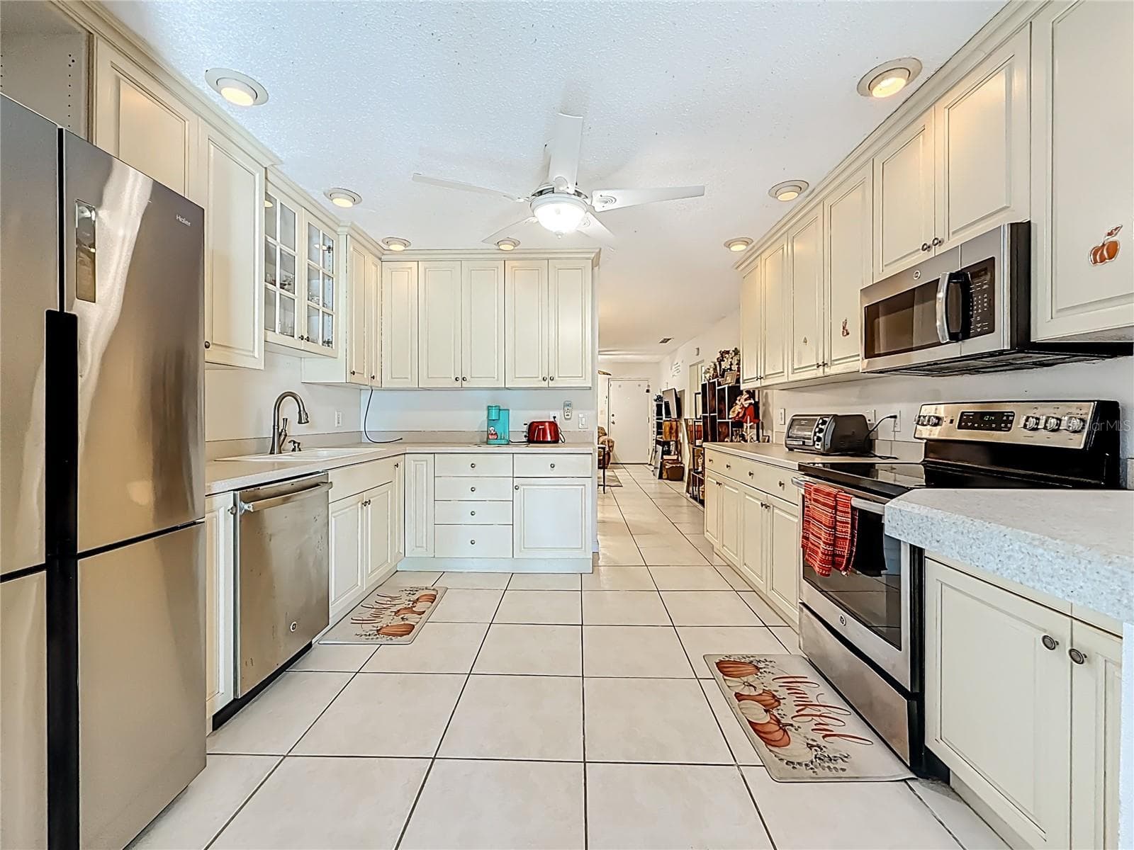 1020 85th Ave N no 119 Kitchen, view toward dining and living - 1020 85TH AVE N #119, ST PETERSBURG