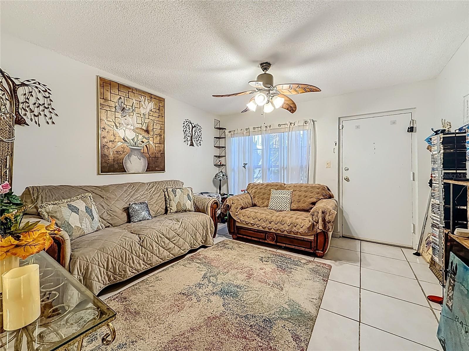1020 85th Ave N no 119 living area, view toward front entry door - 1020 85TH AVE N #119, ST PETERSBURG
