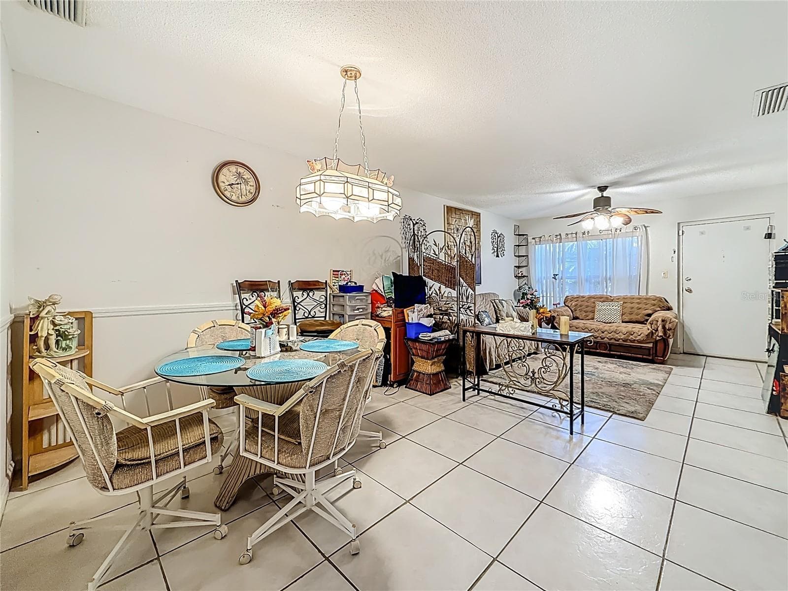 1020 85th Ave N no 119, open dining and living area - 1020 85TH AVE N #119, ST PETERSBURG