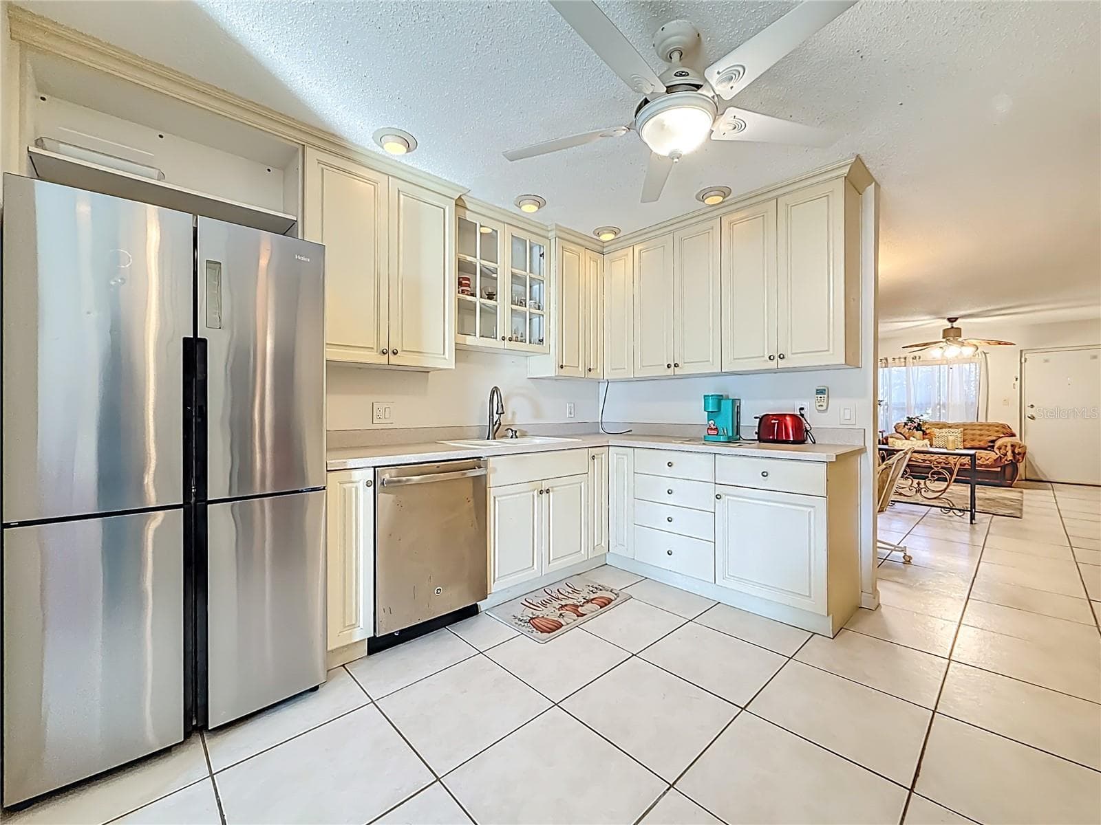 1020 85th Ave N no 119, Kitchen, lots of cabinets for storage - 1020 85TH AVE N #119, ST PETERSBURG