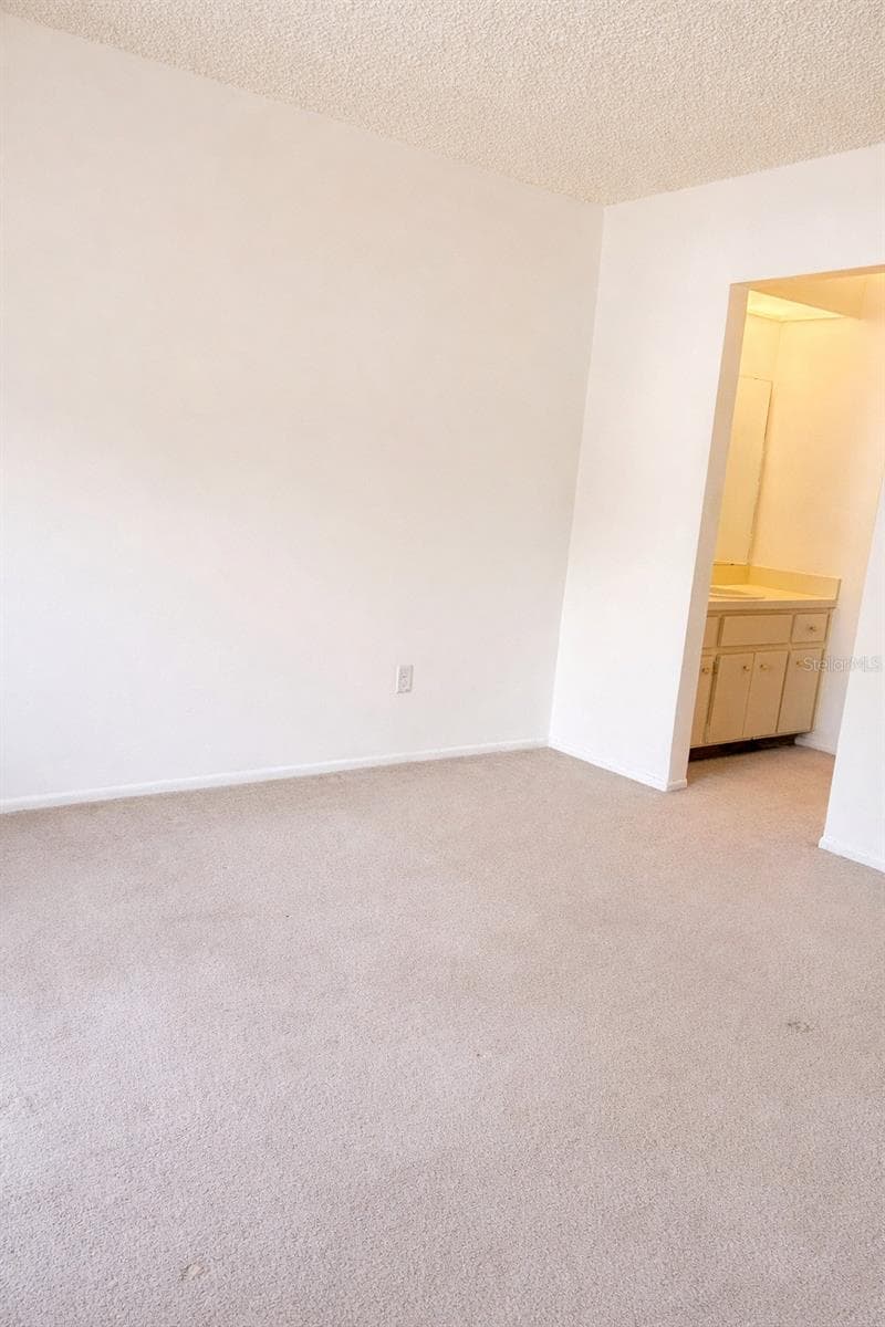 Primary bedroom - 3244 CANDLE RIDGE DR #202, ORLANDO
