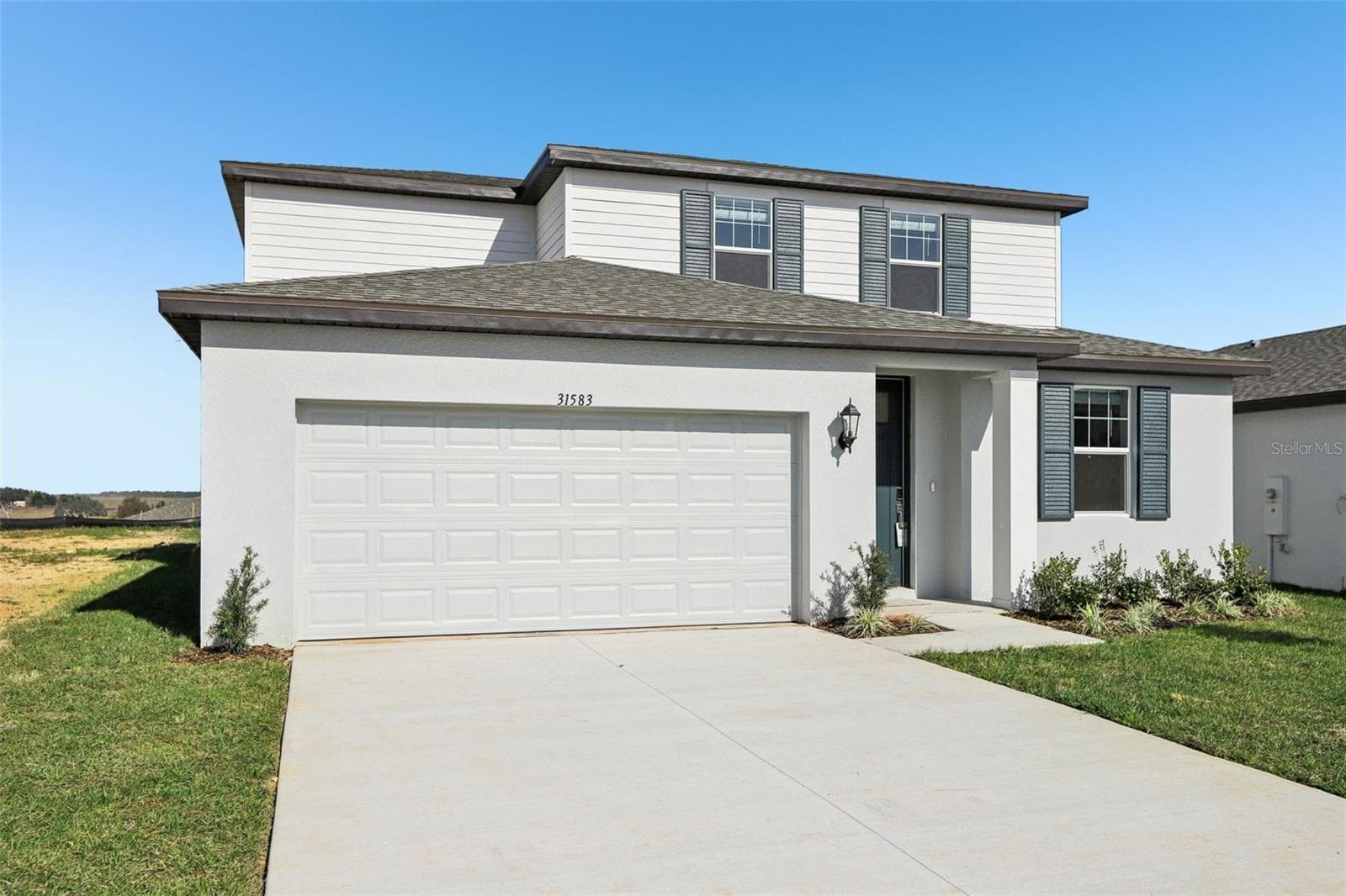Single Family Residence at 31583 WILD GRAPE LN, BROOKSVILLE, photo 2 of 45