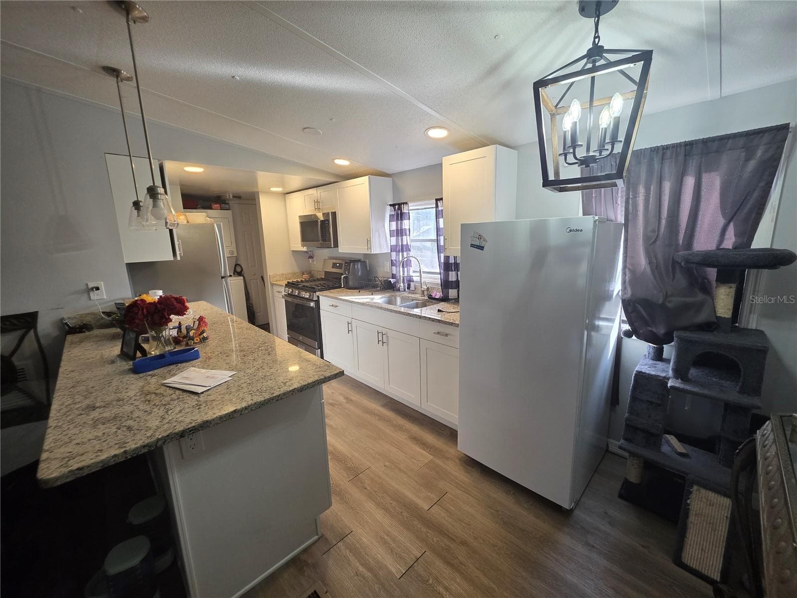 Manufactured Home at 34924 TALISMAN ST, DADE CITY, photo 3 of 12