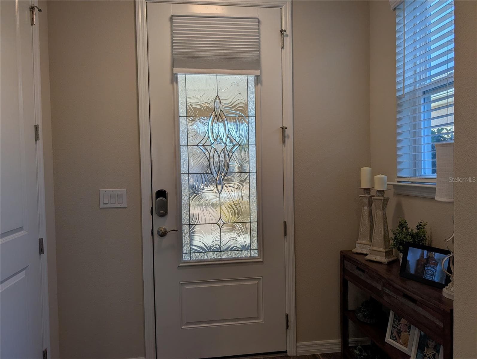 Foyer looking to front door with Coat Closey on left - 4341 NW 57TH AVE, OCALA