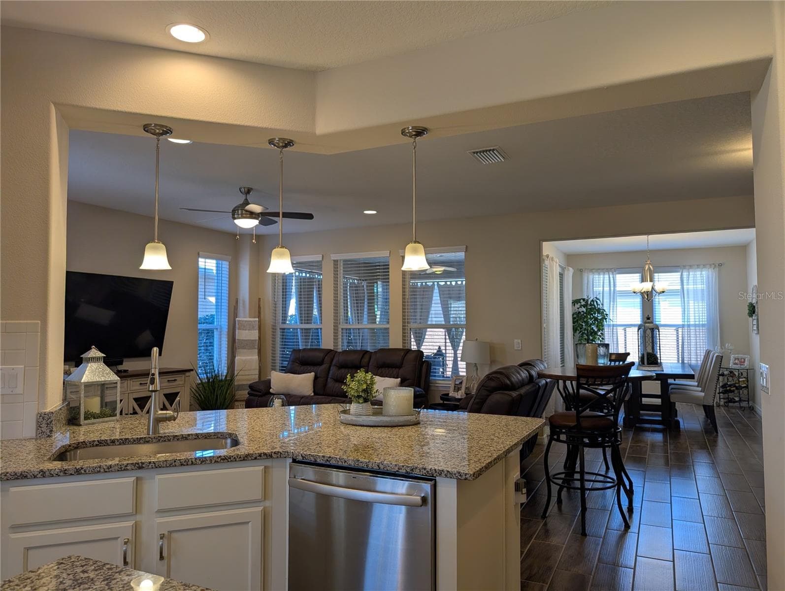 Kitchen to Family room and Dining room on left in rear - 4341 NW 57TH AVE, OCALA