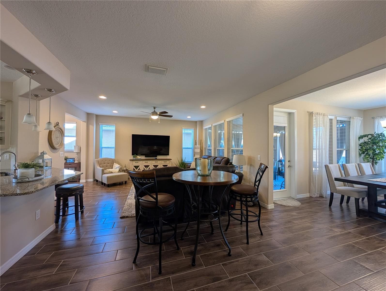 Looking into Family room from the rear and Dining room on right - 4341 NW 57TH AVE, OCALA