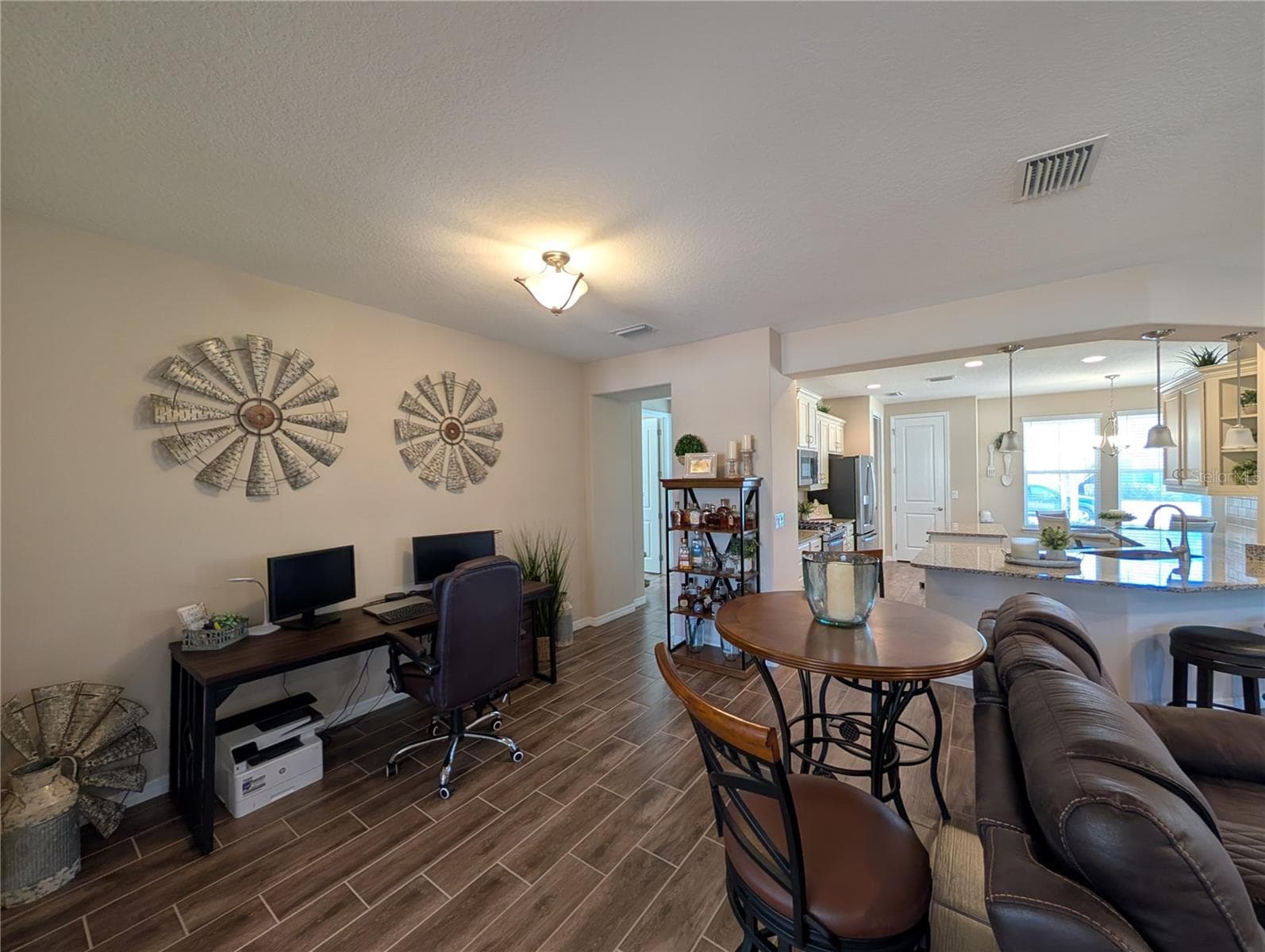 Looking from Dining room toward Kitchen and 2nd Bedroom on left - 4341 NW 57TH AVE, OCALA