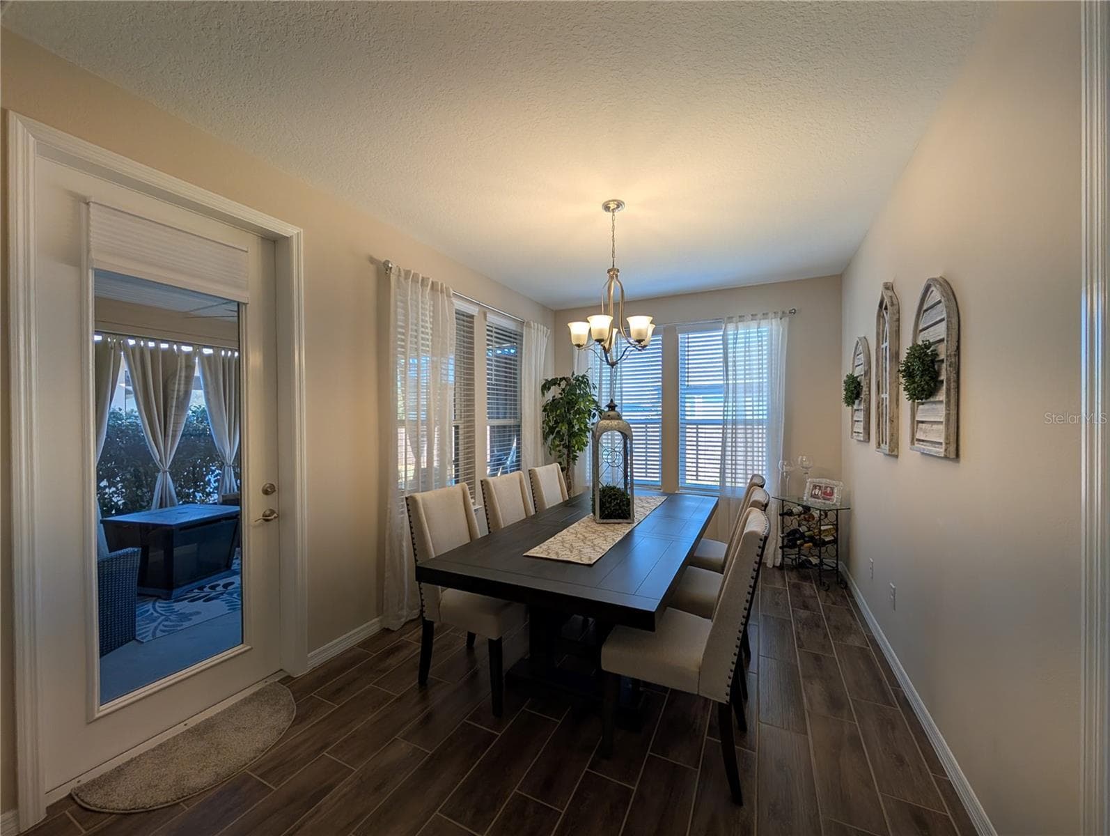Formal Dining room with Door To Screened Porch - 4341 NW 57TH AVE, OCALA