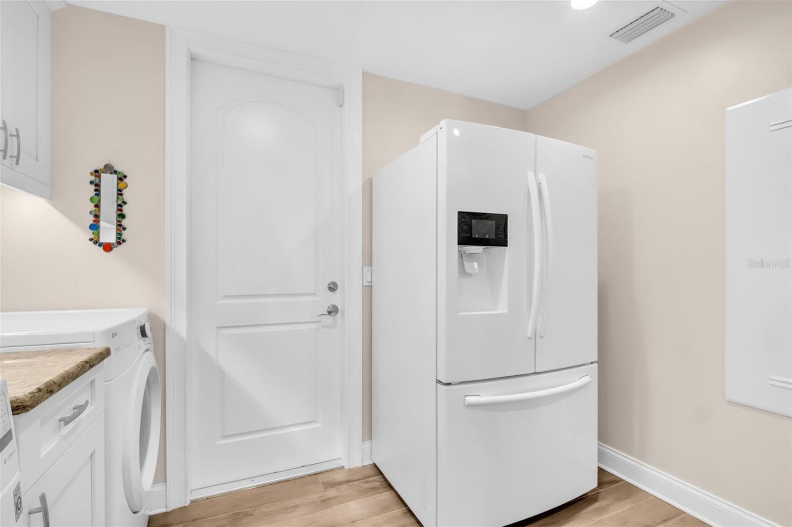 Spacious Laundry/Mudroom off Garage - 1100 FRIENDLY WAY S, ST PETERSBURG