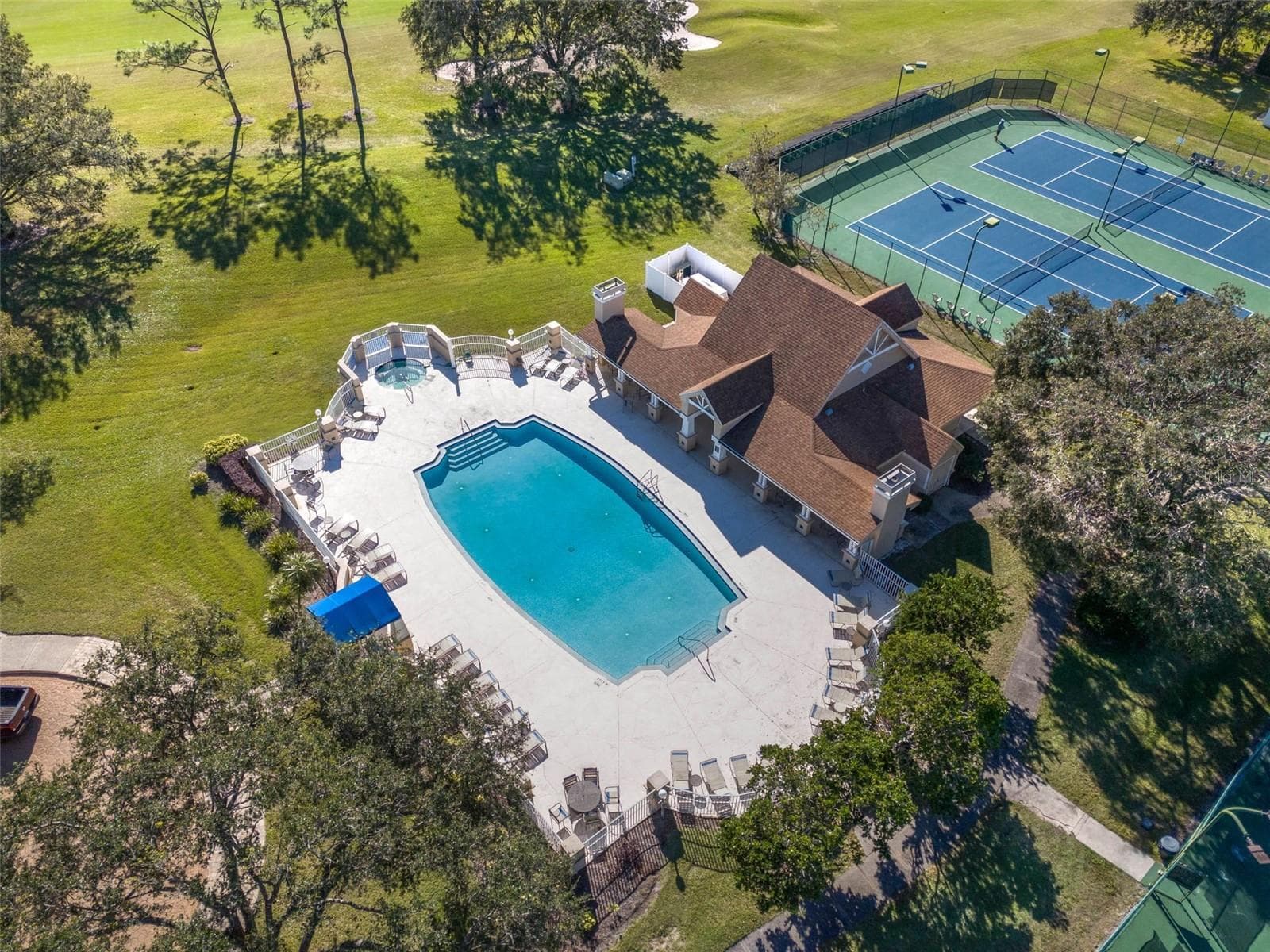 Pool, clubhouse and tennis courts - 8032 PINE HOLLOW DR, MOUNT DORA