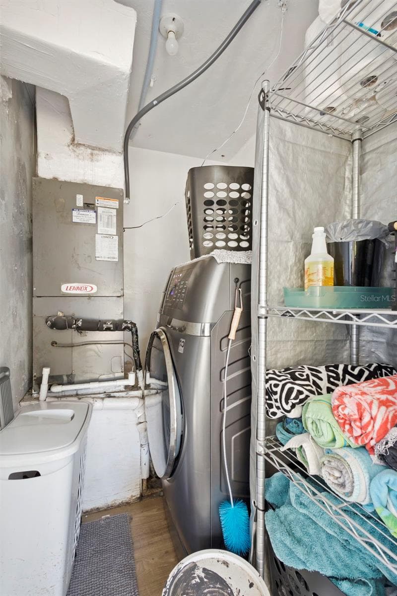 View of private laundry room. - 1552 ZINNIA DR, DELTONA