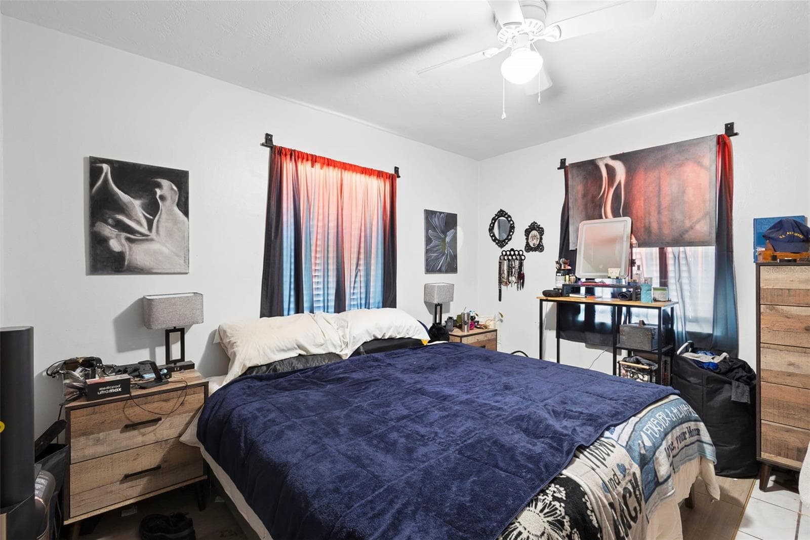 View of primary bedroom from entrance. - 1552 ZINNIA DR, DELTONA