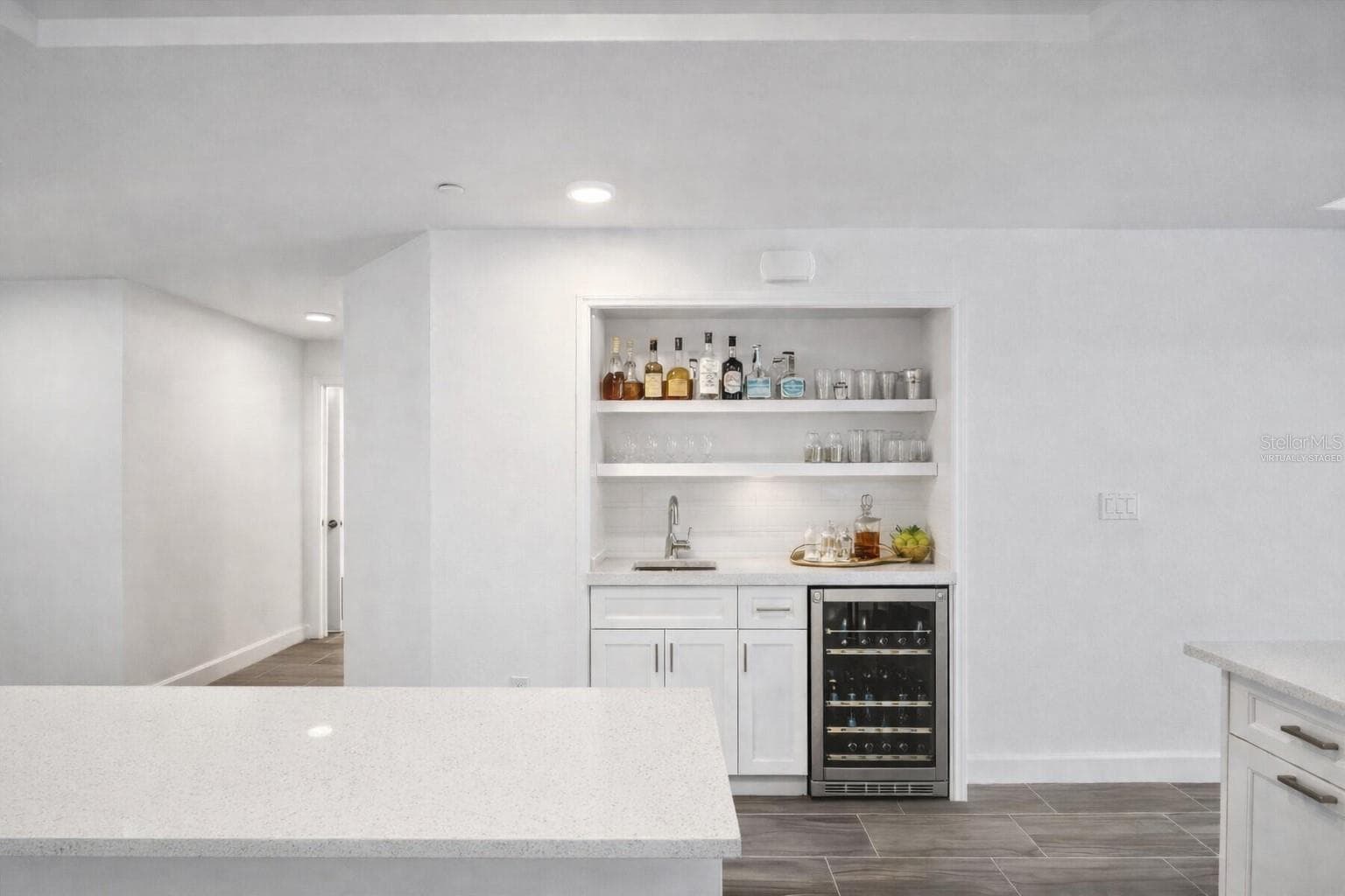 Virtually staged wet bar in place of pantry, water available on this wall - 125 ISLAND WAY #304, CLEARWATER BEACH