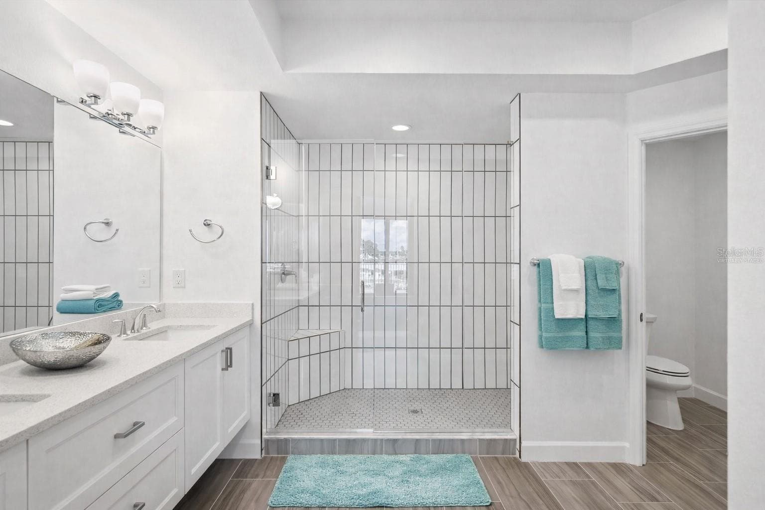 Primary bathroom virtually staged - 125 ISLAND WAY #304, CLEARWATER BEACH