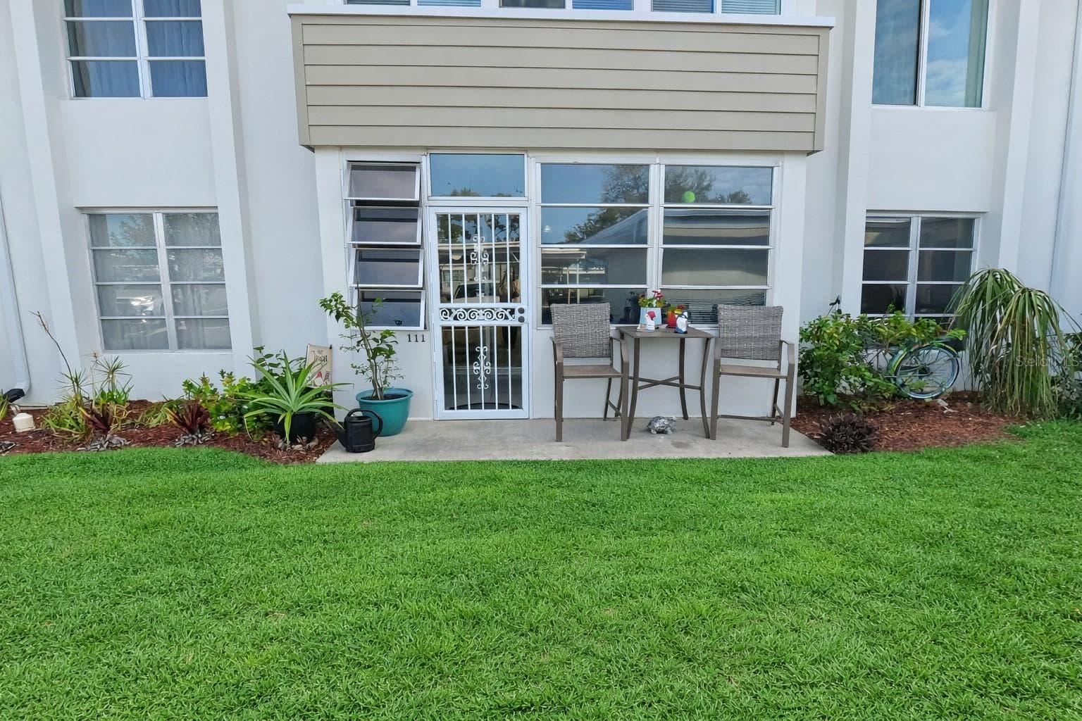 Front Entry Parking lot entrance - 21300 BRINSON AVE #111, PORT CHARLOTTE