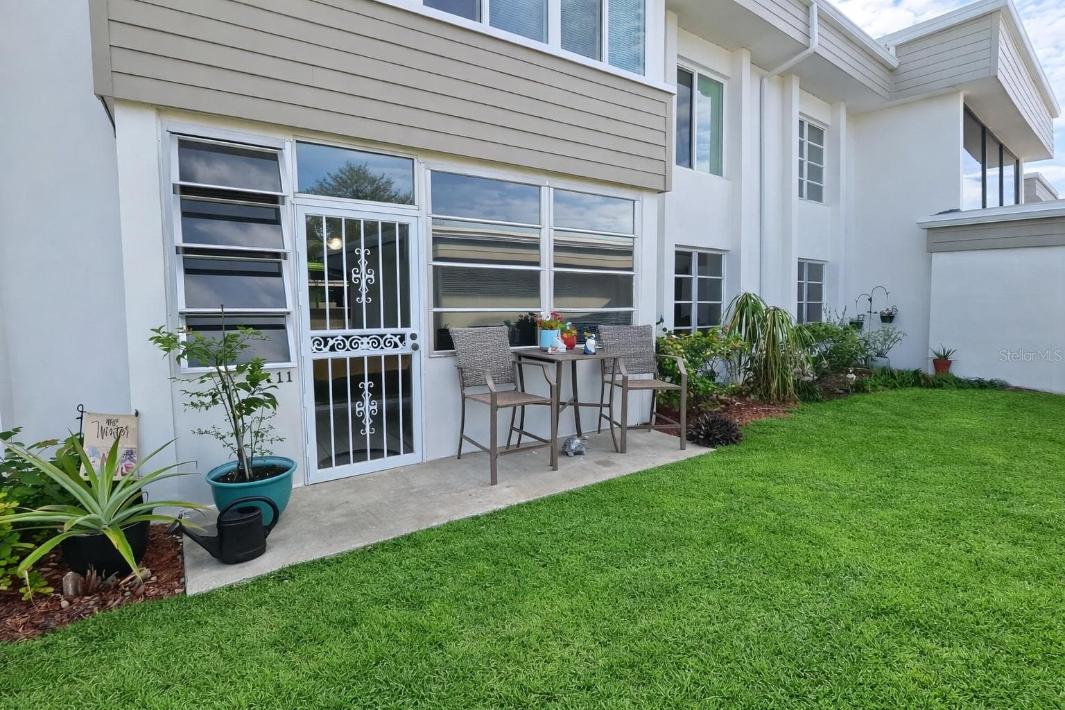 Front Entry Parking lot entrance - 21300 BRINSON AVE #111, PORT CHARLOTTE