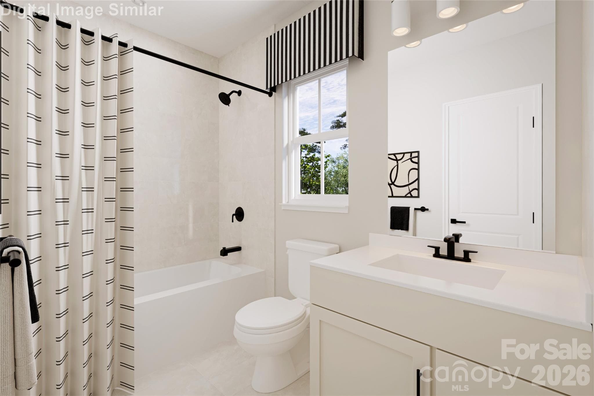 The shared bathroom features sleek, modern lines and a bright, inviting design, complete with a stylish tub for added comfort and convenience. - 4024 Kelton Way, Charlotte