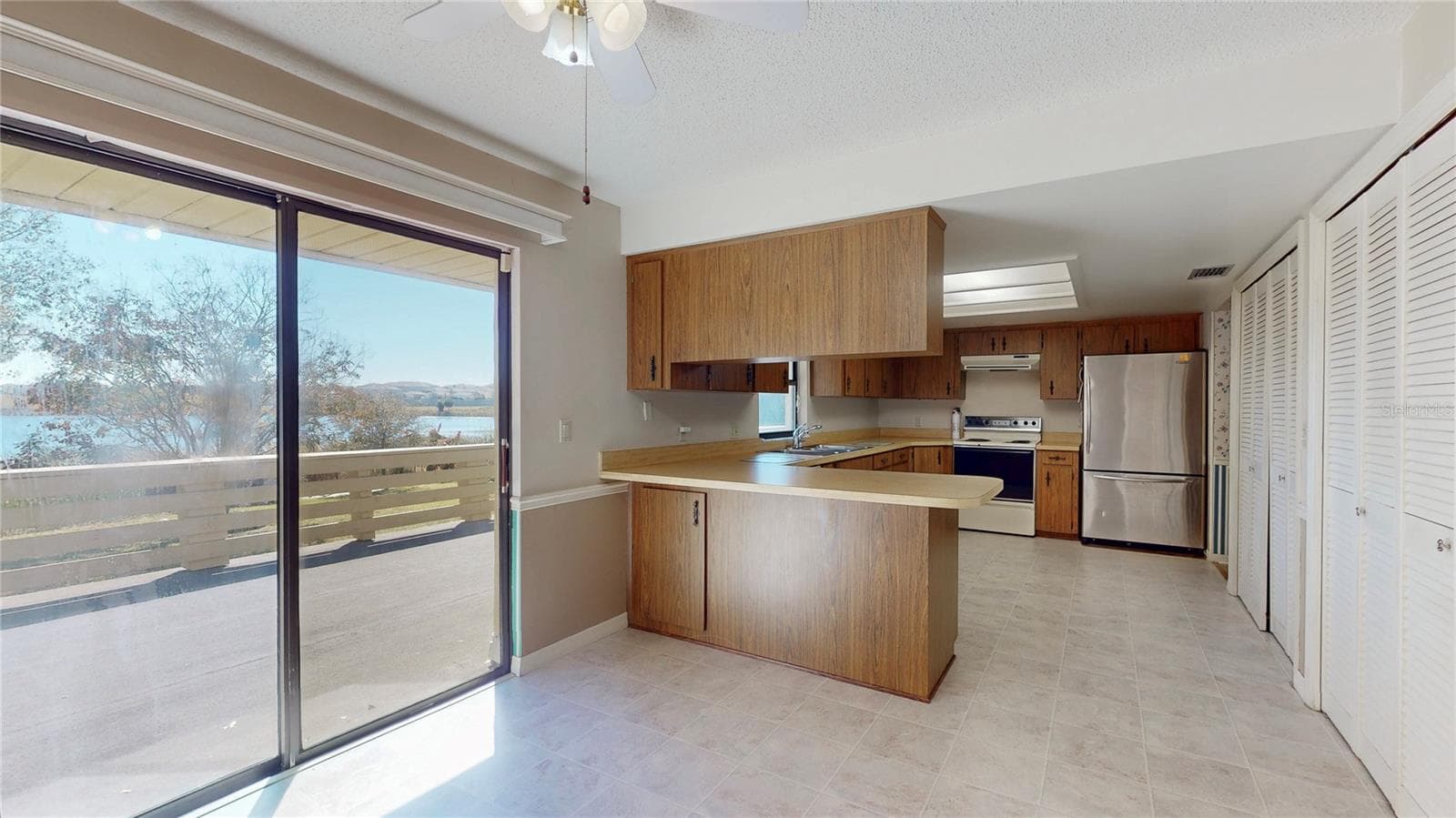 Kitchen and dinette - 13 HERMOSA DR, EUSTIS