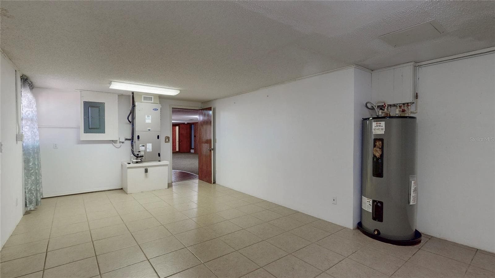 Extra room in basement area. - 13 HERMOSA DR, EUSTIS