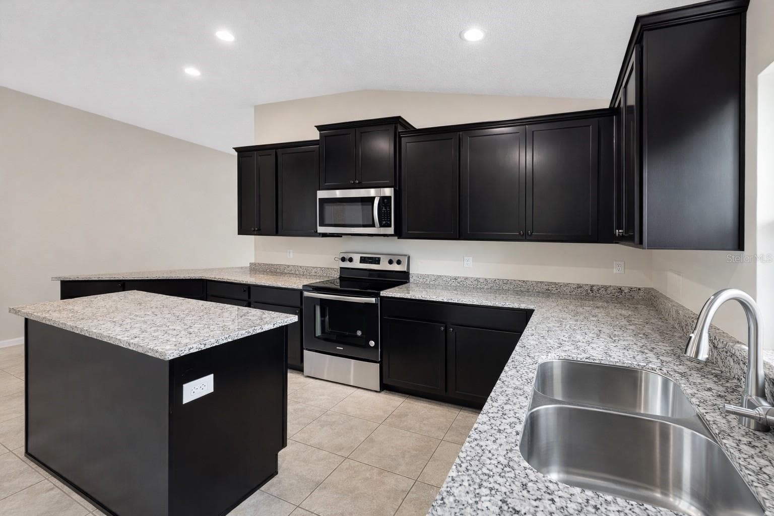 KITCHEN WITH ISLAND - 7544 BENT TREE LOOP, ST CLOUD