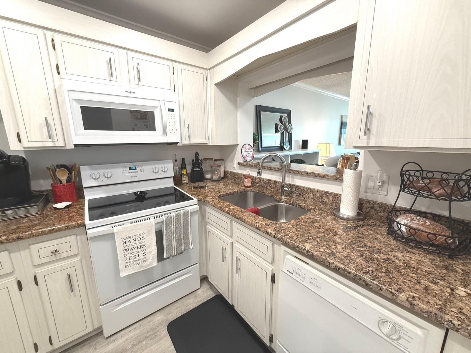 Kitchen with Granite - 100 BLUFF VIEW DR #317A, BELLEAIR BLUFFS